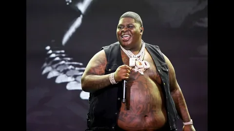 How Tall is BIGXTHA Plug? Unpacking the Rapper’s Stature and Stage Presence